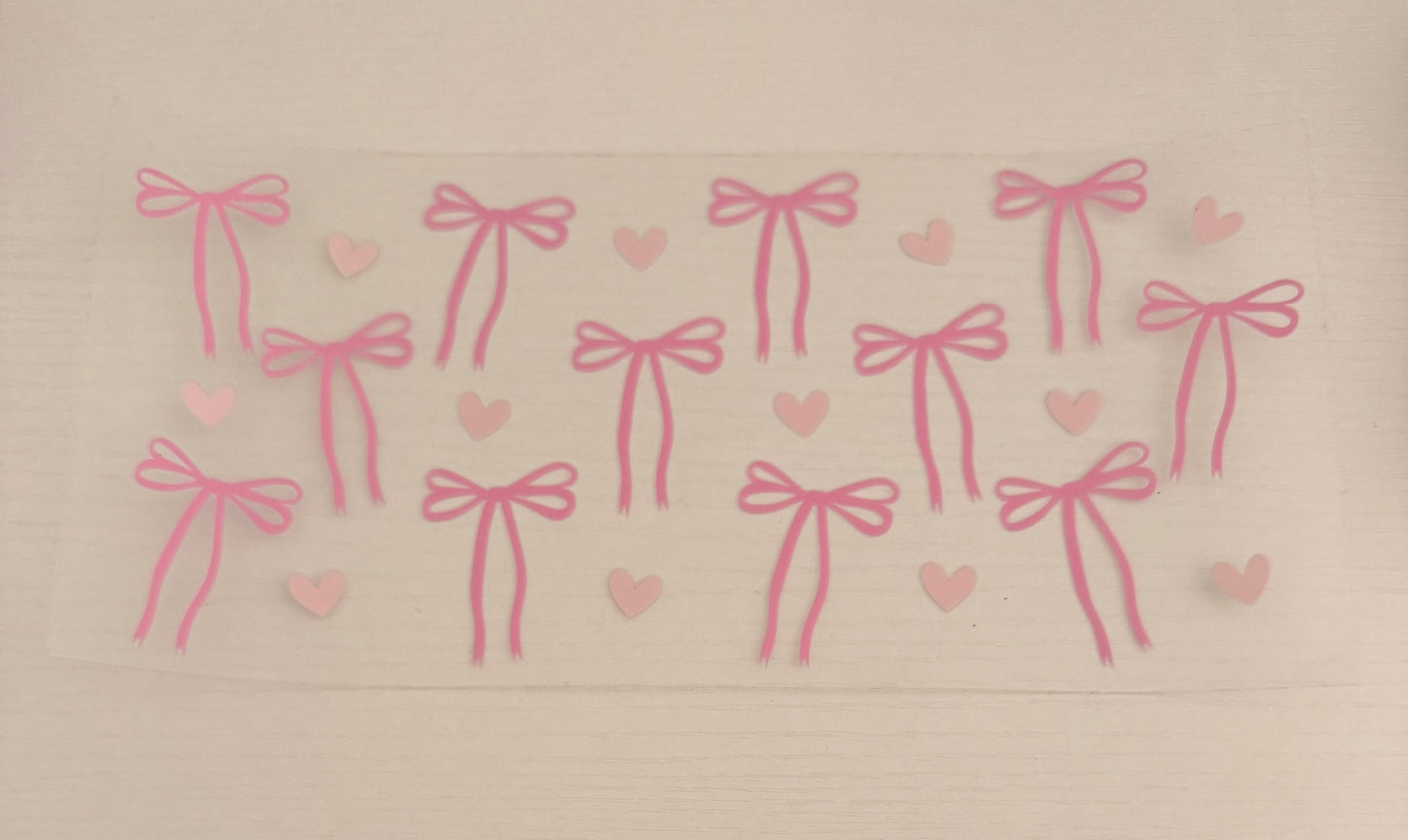 Pink bow with hearts