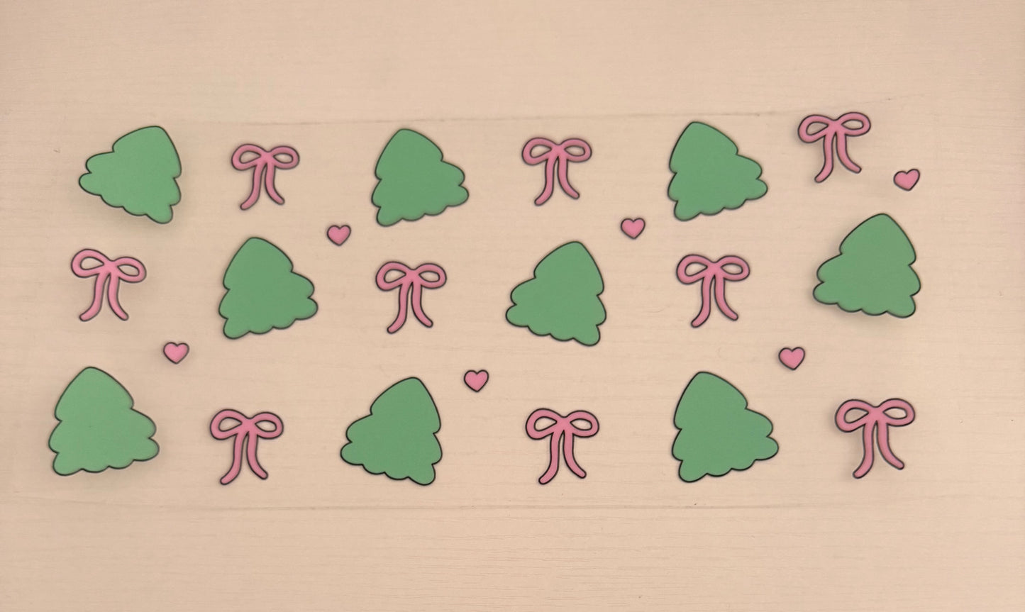Green trees with pink bows