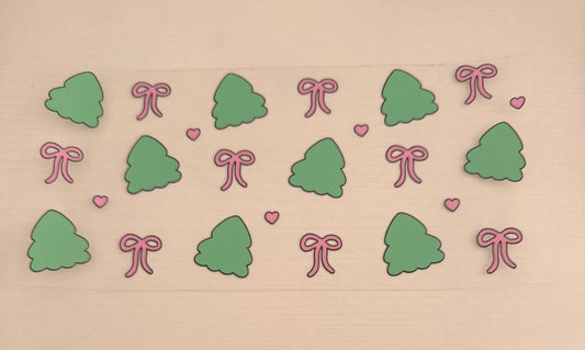Green trees with pink bows
